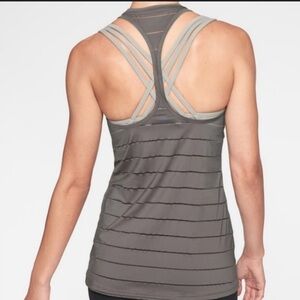Athleta Chi Racerback Tank Top in Mesh Stripe . Grey color. Size Medium.